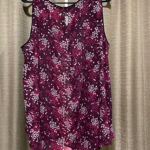 Claudette sleeveless zip top. No tags but has not been worn.